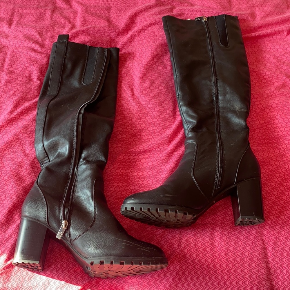 These comfortable platformed black mid thigh high boots are a must have for fall